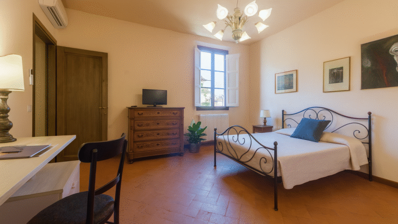 Wrought-iron double bed and desk