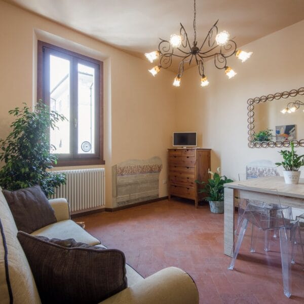 Apartment RED bright living room with sofa bed and TV, Oltrarno